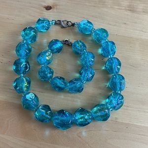 Gorgeous iridescent aqua glass bead necklace and bracelet set.